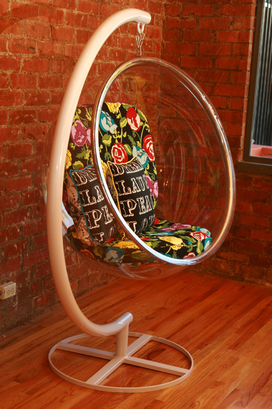 http://www.roomservicestore.com/images/mcmc/hanging_bubble_chair_floral_cushions_543.jpg